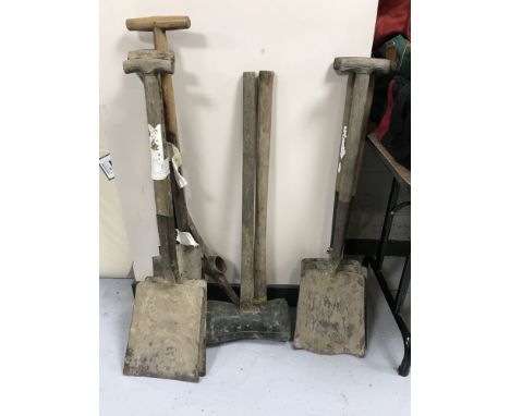 A rubber mallet, pick axe and six assorted shovels and spades 