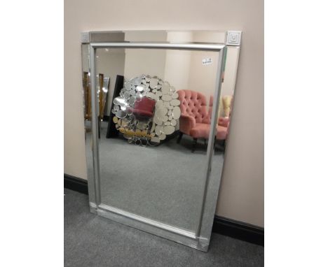 A glass framed mirror 
