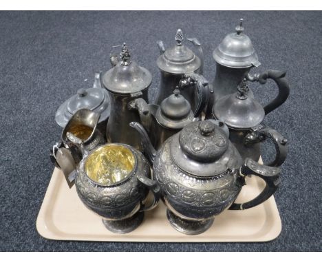 A tray of antique plated three piece tea service (lid missing) together with further five plated teapots and pewter teapot 