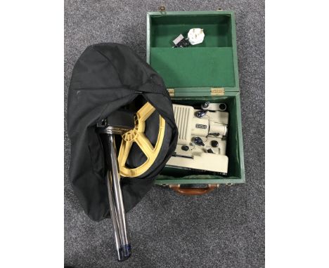 A trundle wheel in bag and a cased Umig vintage projector 