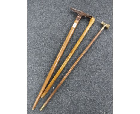 An antique walking cane with French monocle handle together with carved walking stick and Alpine cane