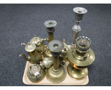 A tray of brass including Aladdin oil lamp, brass tea service, brass bell, candle holders etc 