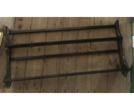 An Ercol plate rack, width 40ins