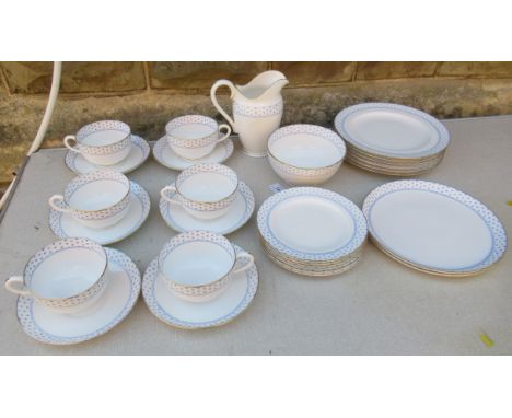 A Royal Worcester breakfast set, comprising six cups, six saucers, six side plates, pair of sandwich plates, six 9ins plates,