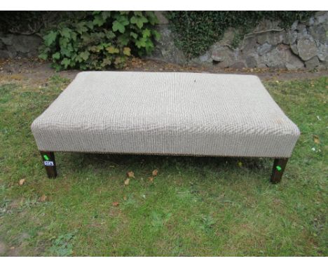 A rectangular foot stool 24ins x 42ins height 12ins, together with tin trunk etc