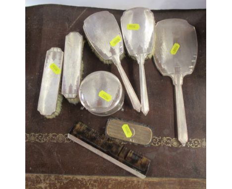 &nbsp;A six piece silver dressing table set, together with a comb and glass and silver dressing table pot