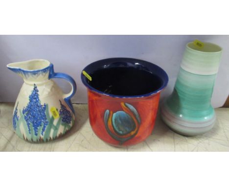 A Shelley vase, together with a Poole jardiniere and a Roskyl jug