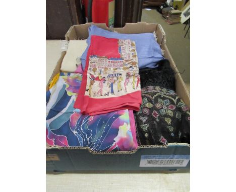 A collection of scarves, throws, including vintage examples
