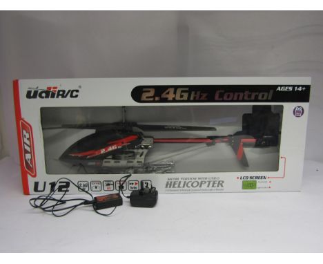 A boxed UDI U12 R/C helicopter 