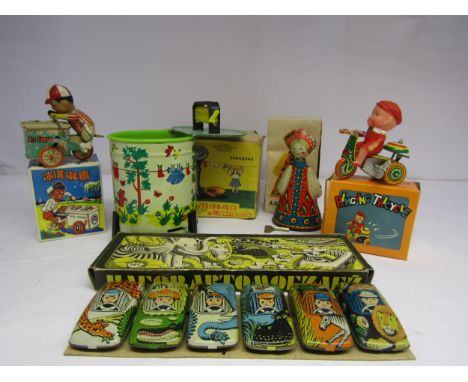 Five boxed tinplate toys comprising Russian made clockwork washing machine, set of six safari cars and dancing doll in folk d