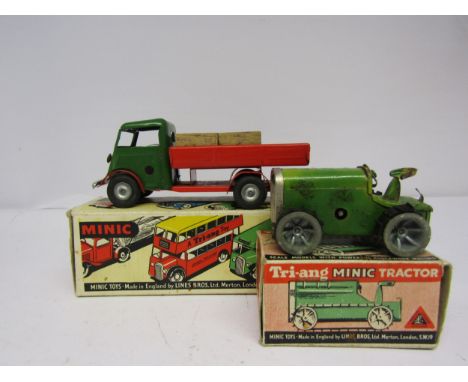 Two boxed Triang Minic tinplate clockwork vehicles to include Tractor (one rubber track disintegrated, metal pitted) and Deli