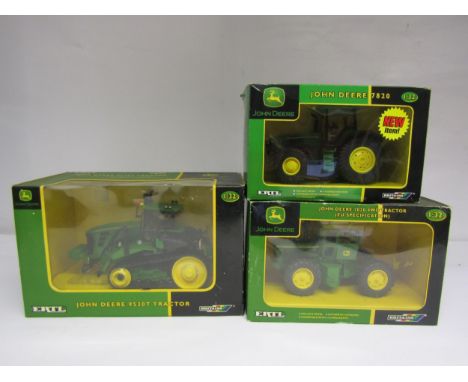 Three boxed Britains ERTL 1:32 scale diecast John Deere farm vehicles comprising 42458 9530T Tractor, 42103 7020 4WD Tractor 