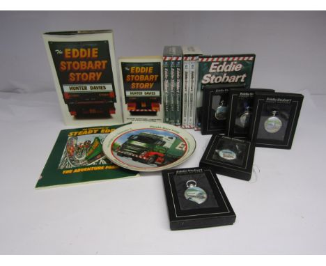 A collection of Eddie Stobart collectibles including five boxed Atlas Editions pocket watches, set of coasters, collectors pl