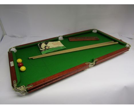 A Joe Davis miniature table top billiards/snooker table with two cues, scorer and rule book, 93cm x 47cm 