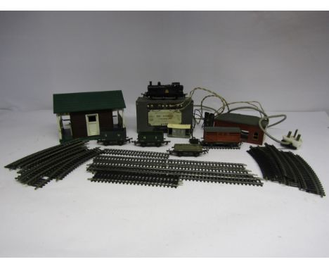 A small collection of loose 00 gauge model railway items including Triang R52 BR 0-6-0 locomotive 47606, four wagons, R60 tic