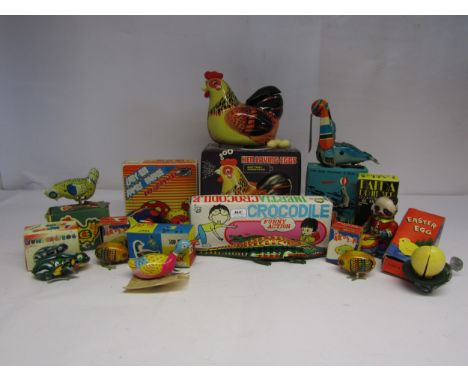 A collection of boxed Chinese mechanical/battery operated tinplate novelty animal toys to include Panda Drummer, The Seal Pla