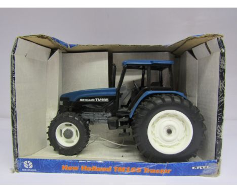 A boxed ERTL 1:16 scale diecast 13577 New Holland TM165 Tractor 