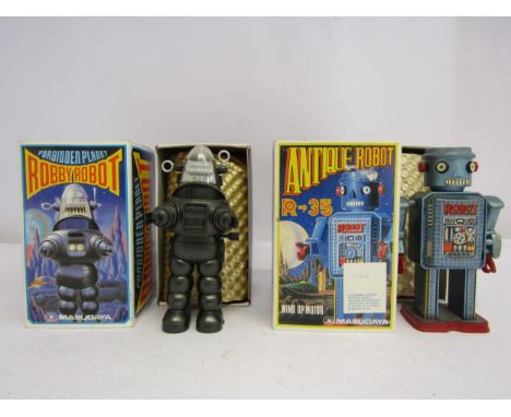 Two boxed 1980's Masudaya (Japan) wind up robots comprising black plastic Forbidden Planet Robby Robot and tinplate and plast