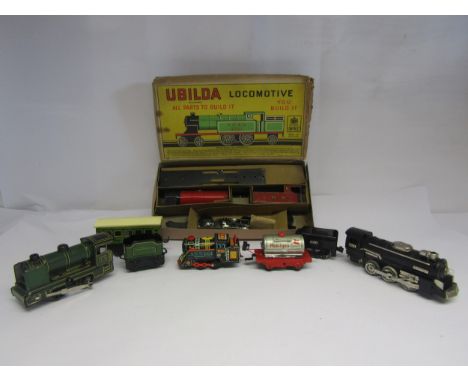 A boxed Chad Valley Ubilda 0 gauge tinplate locomotive construction kit, together with an unboxed German Fir Tree clockwork 0