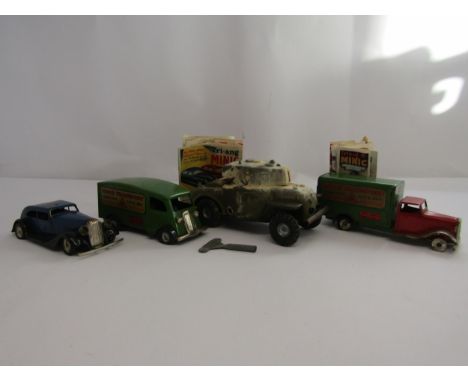 Four unboxed Triang Minic clockwork vehicles to include armoured car (damaged), two Minic Transport vans and Vauxhall Tourer 