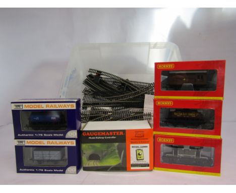 Five boxed items of 00 gauge model railway rolling stock to include Hornby R6509 BR 20 Ton Brake Van, R6535 6 Wheel Milk Tank