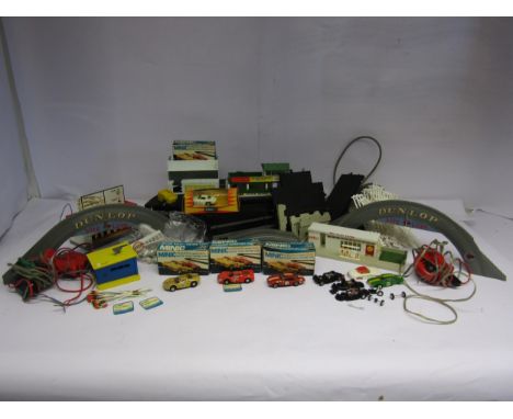 A collection of Triang Minic Motorways slot racing items including boxed M1576 Ferrari 500 Superfast, M1588 Ferrari 330 P4, M