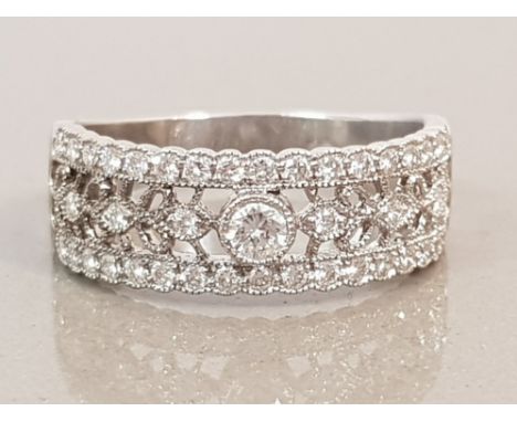 PLATINUM DIAMOND BAND APPROXIMATELY  .50CT 6.4G SIZE R