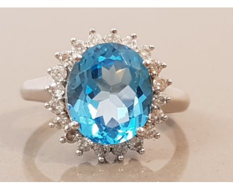 9CT WHITE GOLD BLUE STONE AND DIAMOND CLUSTER RING APPROXIMATELY .50CT 5.3G SIZE R