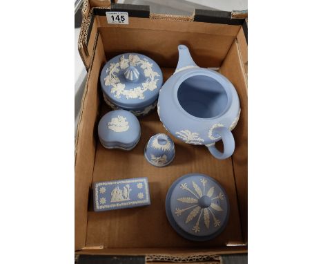 A collection of pottery to include Wedgwood jasperware teapot, trinket boxes, ornate bell etc (7)