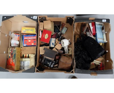 A collection of vintage items to include vinatge camera's, mink stole, brass items , razors , board games etc (3 trays)