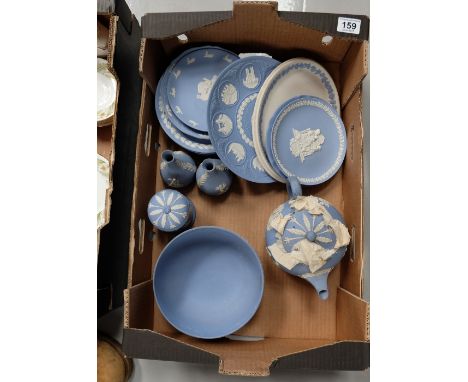 A collection of pottery to include Wedgwood jasperware christmas plates, peter rabbit plates, bud vases, teapot and large foo