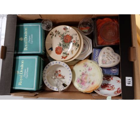 A collection of pottery to include Royal Doulton boxed christmas cup and saucer sets, Coalport peking plates, Wedgwood trinke