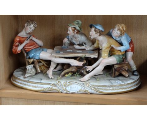 A Tiche large figure group of a group of young men playing cards called The Cheat, 