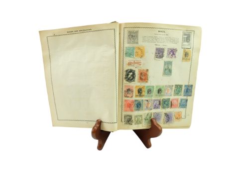 The Triumph Illustrated Stamp Album containing a collection of 19th Century and later GB and world stamps including a 1d red,