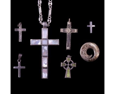 A large articulated silver and mother-of-pearl pendant cross on a heavy marine and fetter link white metal neck chain, togeth