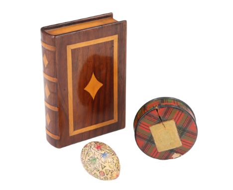 A 19th Century tartan ware pocket snuff or similar box, together with a small hand-decorated gesso-covered wooden egg, and an