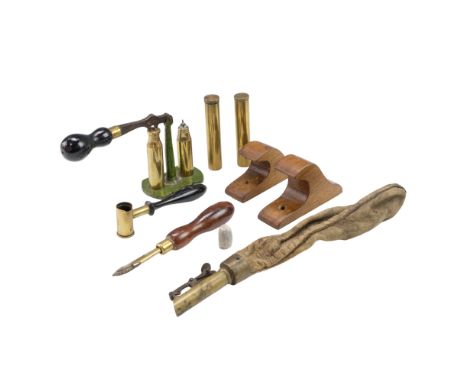 A Victorian 12-bore shotgun cartridge capping and de-capping tool together with a gunpowder measure, a shot pouch with brass 