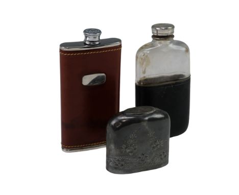 A Victorian leather-covered and electroplate-mounted glass hip flask, having an integral EPBM cup, together with a late 20th 