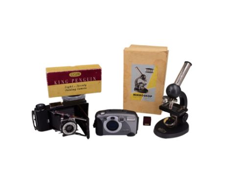 A boxed 1950s Kershaw King Penguin Eight-Twenty folding camera, together with a Kodak DC280 Zoom digital camera and a Studio 