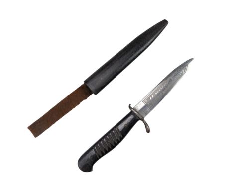 An Imperial German Army trench knife with spurious Waffen-SS blade etching