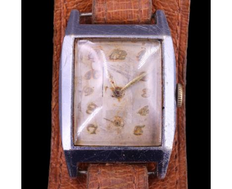 A Second World War presentation wristwatch, its case back bearing the engraved inscription "Presented by Neighbours and Frien