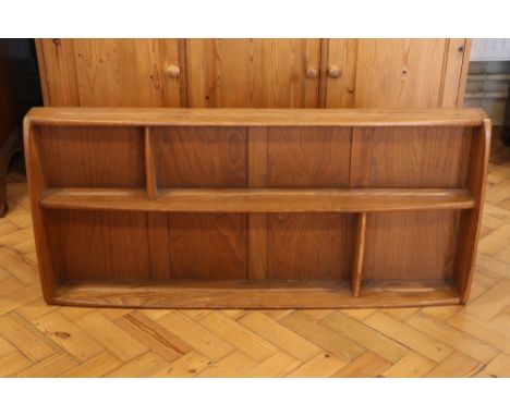A set of mid-20th Century Ercol teak wall-mounting shelves, 108 cm x 13 cm x 49 cm