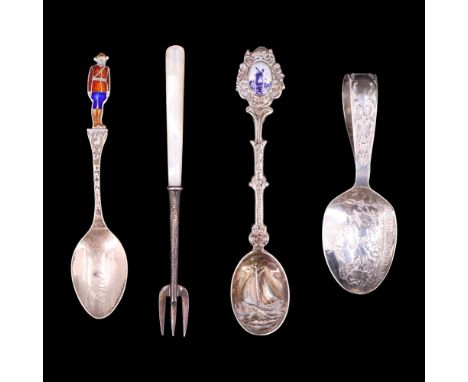 An early 20th Century "Hey Diddle Diddle" infant's nursery rhyme silver spoon, a mother-of-pearl handled silver pickle fork, 