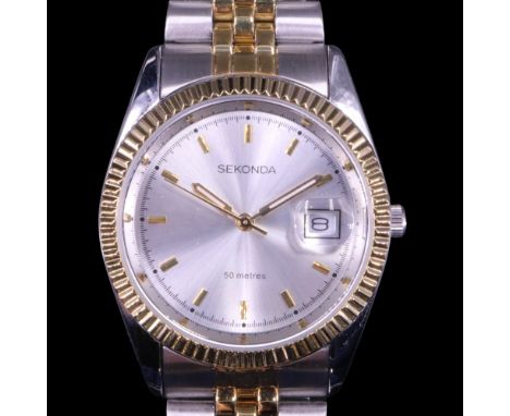 A boxed Sekonda stainless steel wristwatch having a quartz movement and a radially brushed silver face with luminous gilt han