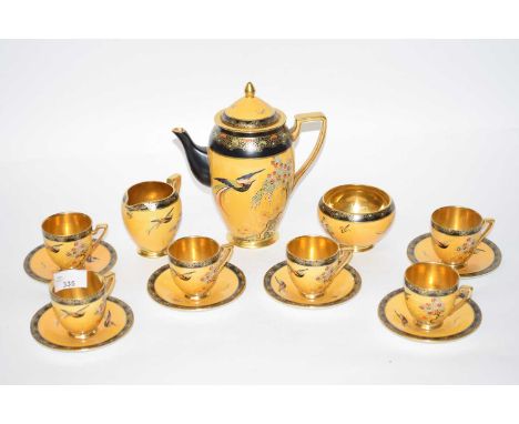 A Carlton ware coffee set, the yellow ground decorated with exotic birds, set comprising coffee pot and cover, milk jug, suga