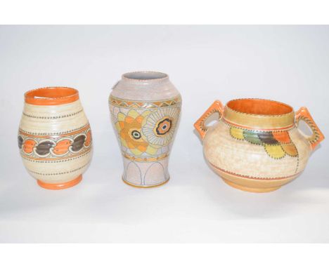 Group of Charlotte Rhead ceramics for Crown Ducal including a vase with Persian rose design, a bowl and further vase, 22cm hi