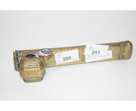 An Islamic brass scribes case with Islamic style decoration, 20cm long