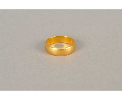 A 22ct gold ring, hallmarked Birmingham 1984, ring size P, weight approx 5.3g