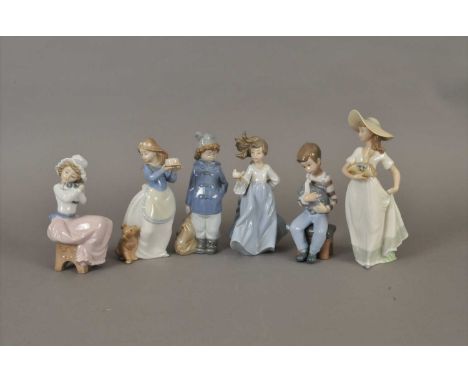 A collection of eleven Spanish Nao porcelain figures, predominantly of young children circa 1980s/90s comprising “Little Girl