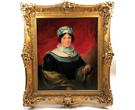 British school, 19th century, Portrait of a lady, half length, oil on canvas, 91 x 76cm